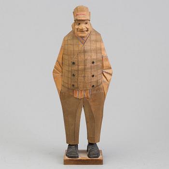 CARL JOHAN TRYGG, carved wood figure, signed and dated Norrköping 1920.