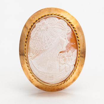 Two brooches and a ring, 14K and 18K gold and sea shell cameos.