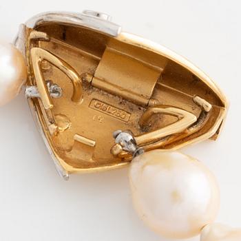 Ole Lynggaard lås 18K guld med en rund briljantslipad diamant.