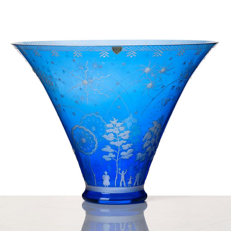 Edward Hald, an engraved blue glass "Fyrverkeriskålen" glass bowl, Orrefors 1957, engraved by Karl Rössler.