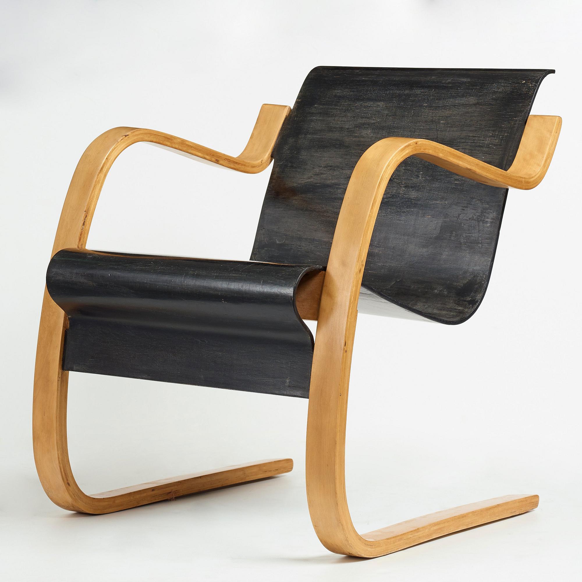 ALVAR AALTO, a birch plywood model 31 cantilevered chair, karmstol, modell nr 31, O.y Huonekalu-ja Rakennustyötehdas, Finland.