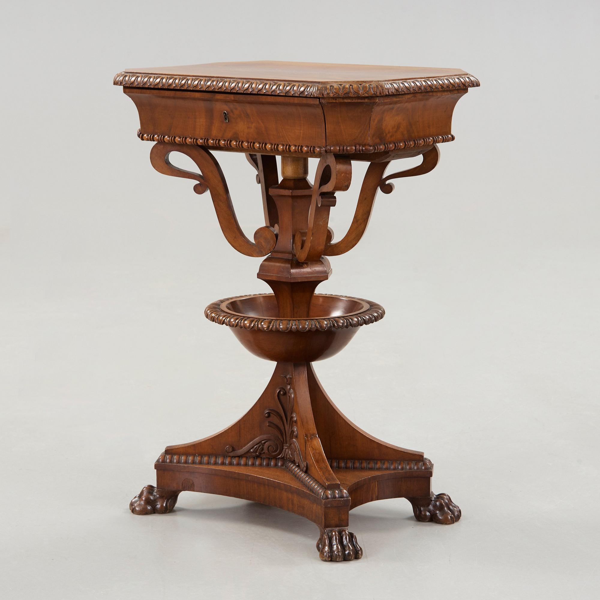 A Swedish Empire mahogny table.