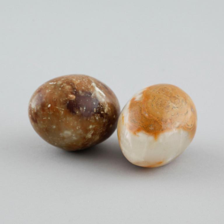 13 stone eggs from the late 20th century.