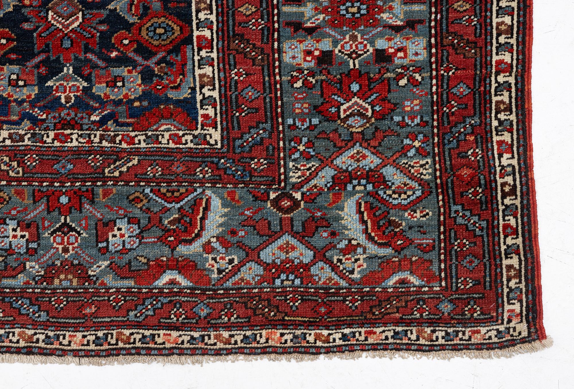 A Malayer runner, west Persia, c. 560 x 200 cm.