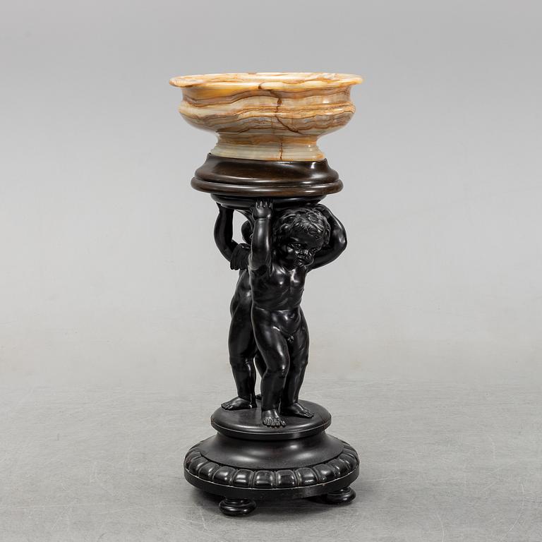 A wooden pedestal with onyx bowl, 20th Century.