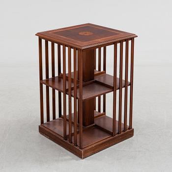 A mahogany veneered revolving bookcase, late 20th Century.
