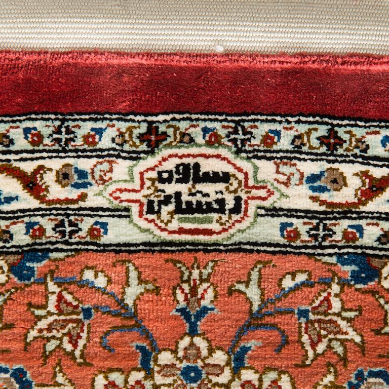 A silk Qum rug, circa 152 x 101 cm.