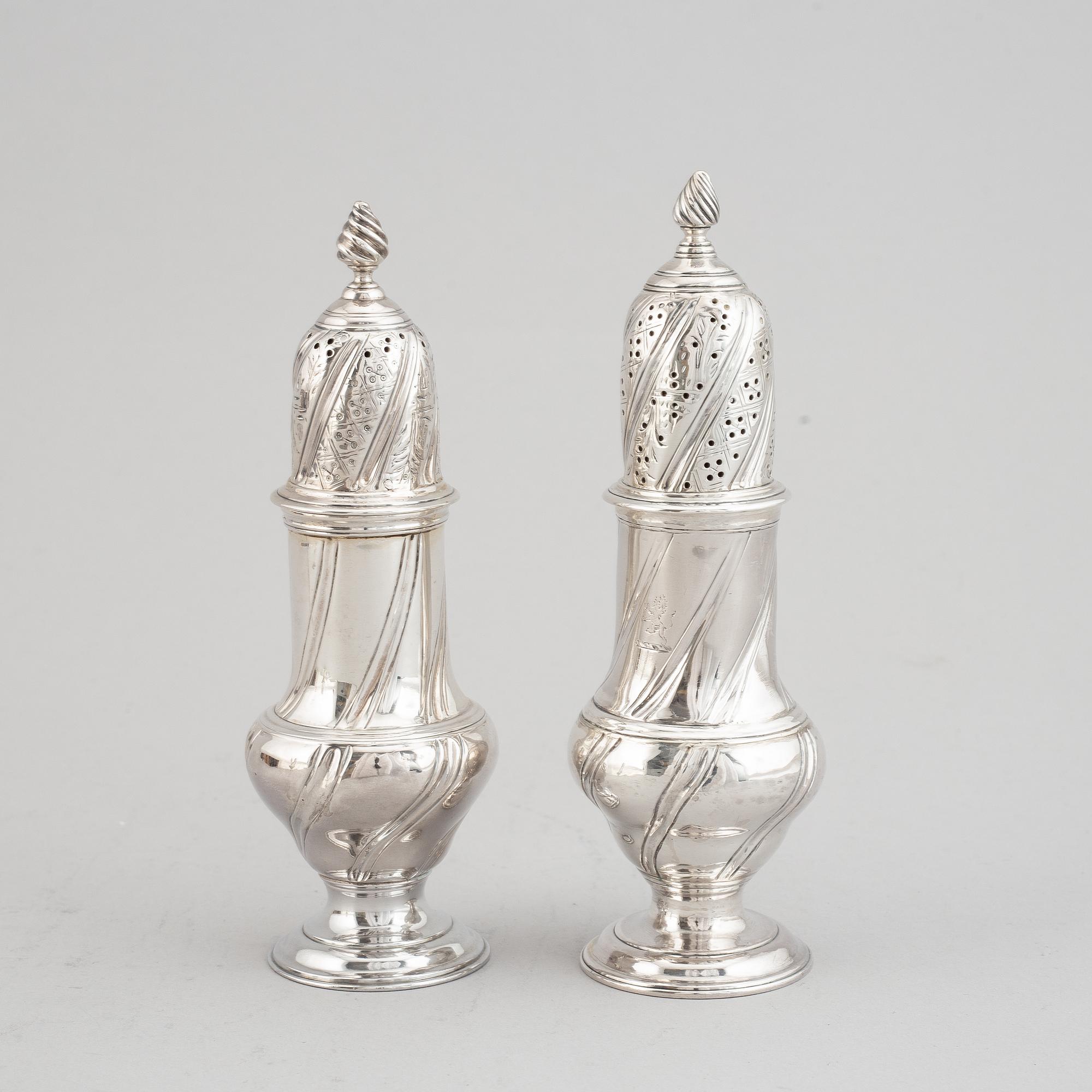 A set of three English 18th century silver sugar and spice casters, marked RP, London 1763.