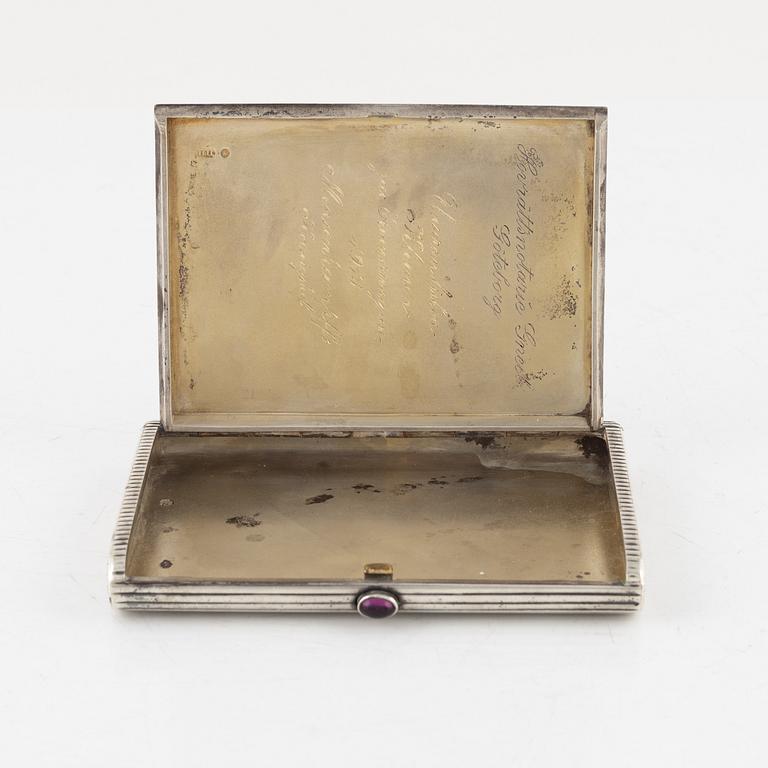 A silver cigarette case, Moscow 1908-26, unidentified maker's mark.