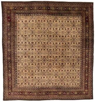 An antique Agra carpet, north India c. 430 x 392 cm.