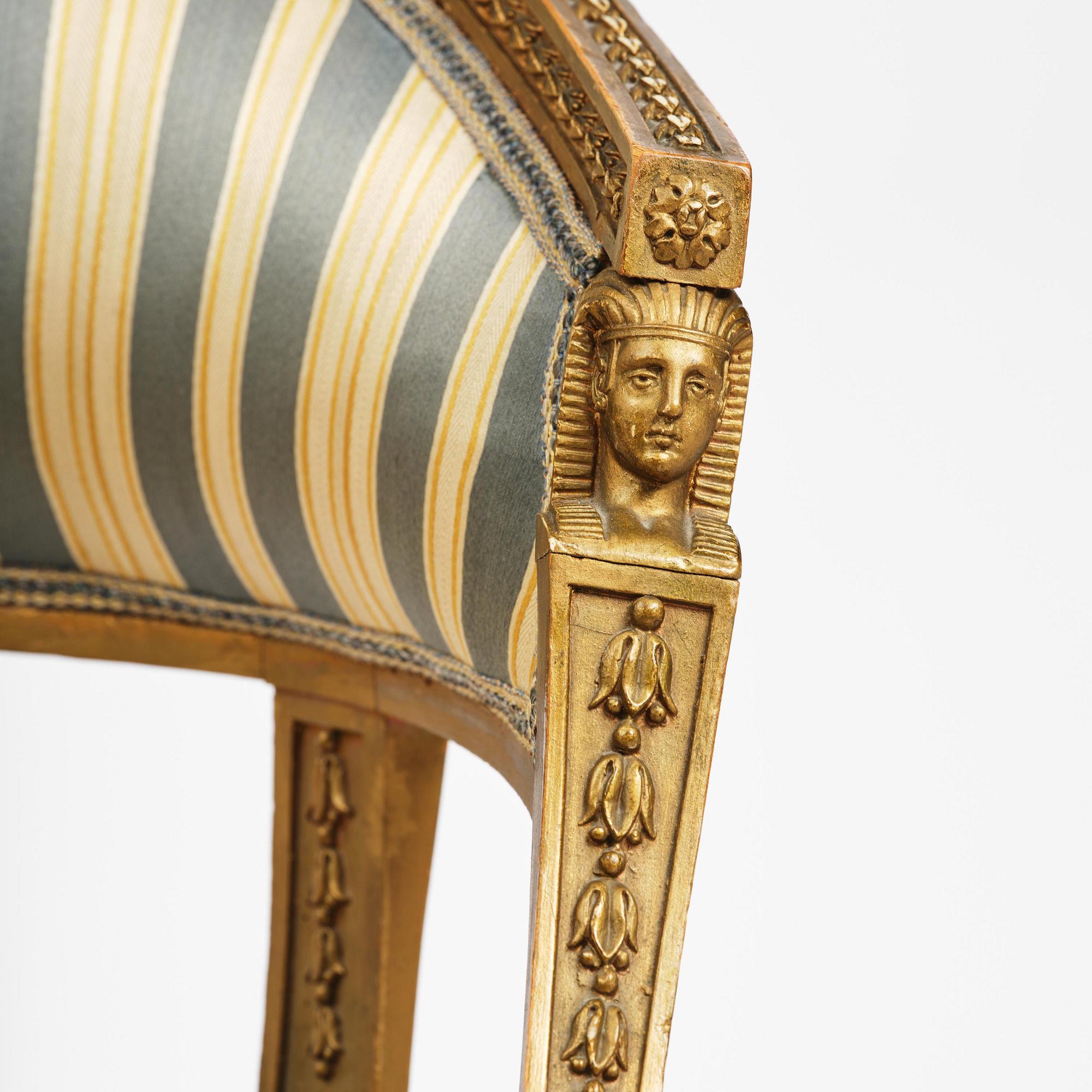 A pair of late Gustavian open armchairs attributed to E. Ståhl (master in Stockholm 1794-1820).