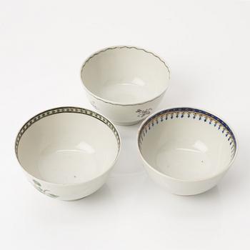 A group of nine Chinese export porcelain cups with stands, Qing dynasty, late 18th century.
