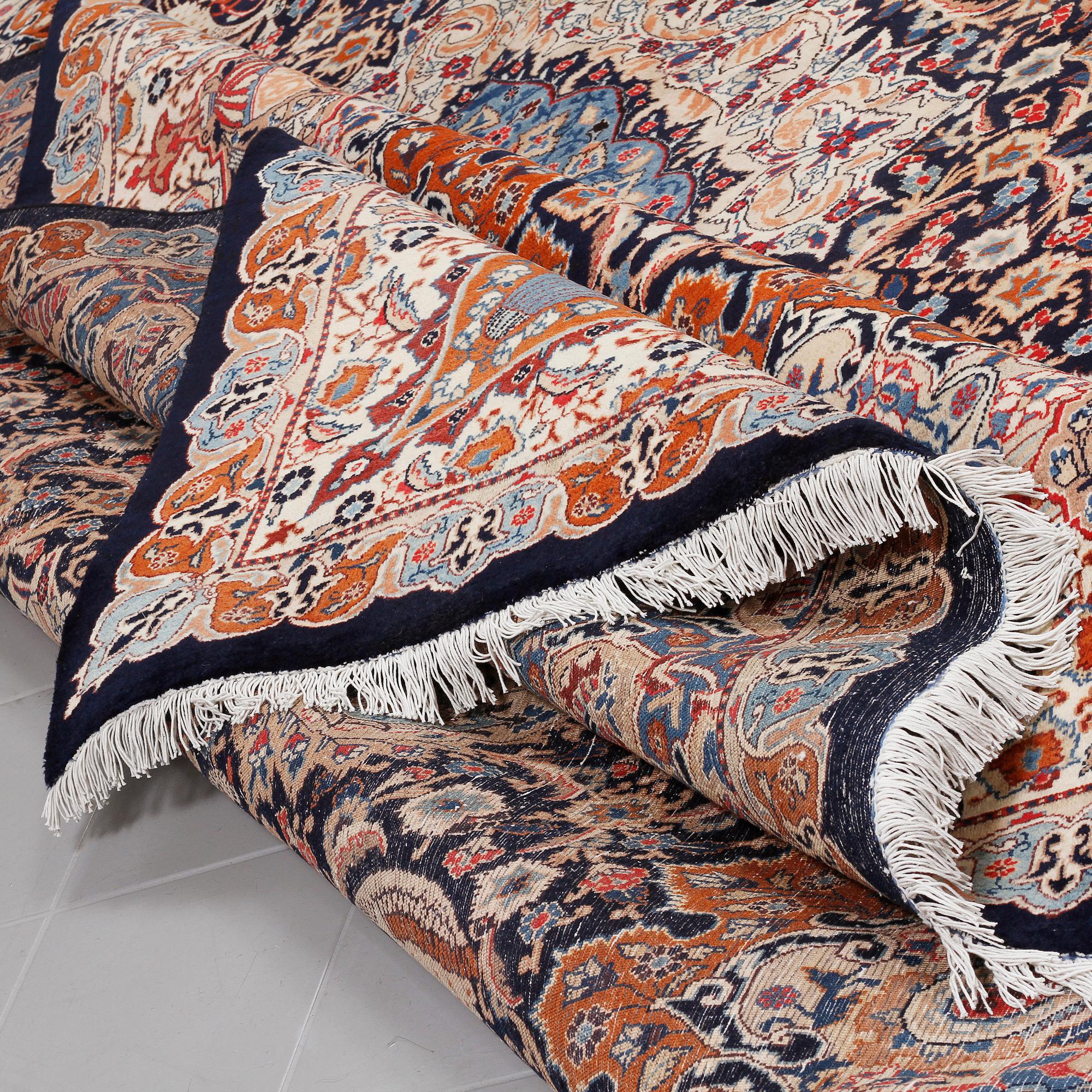 A KASHMAR RUG, 392 x 297 cm.