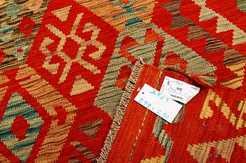 A Kilim carpet, Afghanistan, c. 298 x 251 cm.