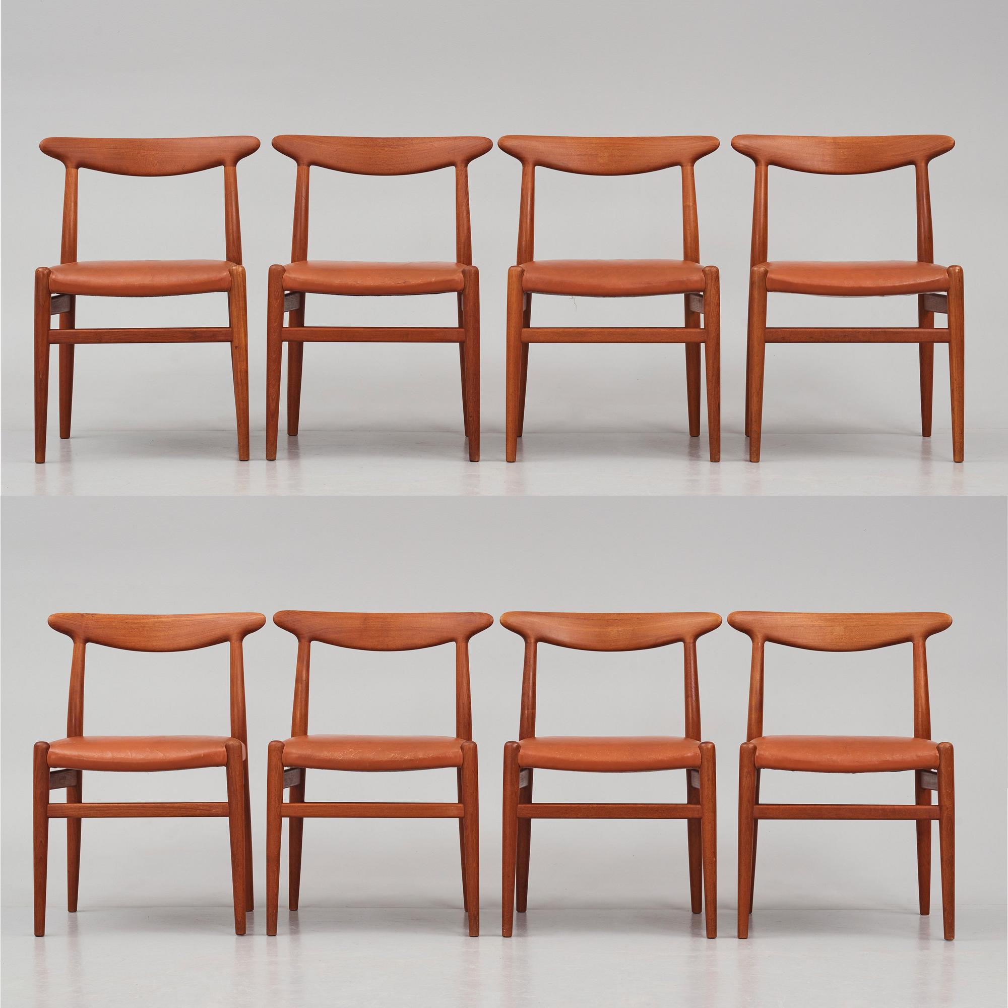 Hans J. Wegner, a set of eight teak chairs model "W2", C.M. Madsens Fabriker, Denmark 1950s.