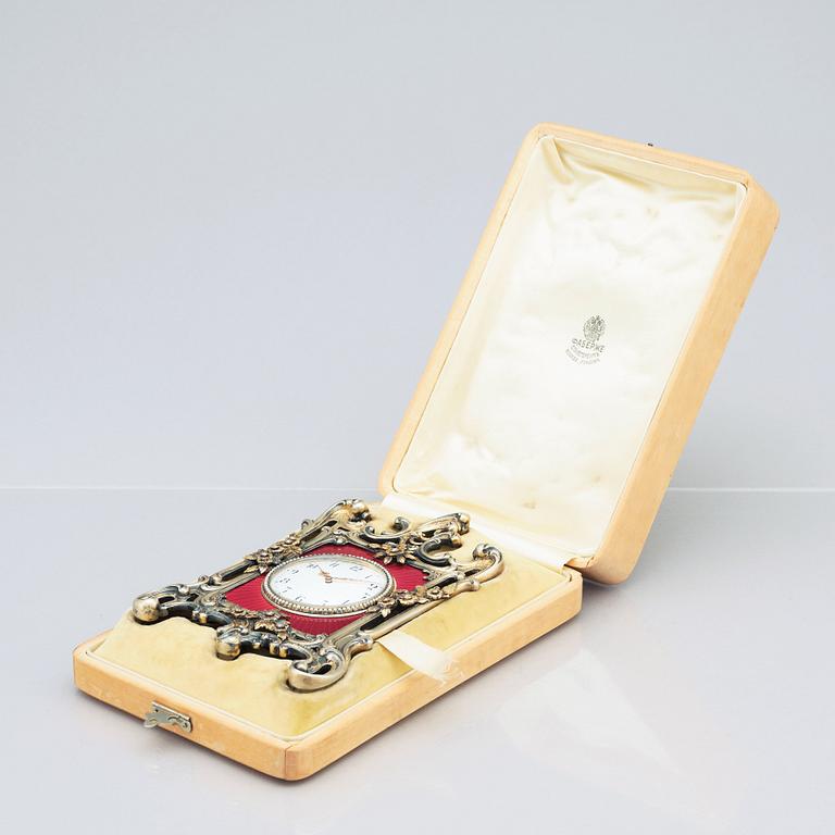 A Fabergé, Nobel family, jewelled, silver-gilt, guilloché enamel desk clock, workmaster Michael Perchin, St Petersburg.