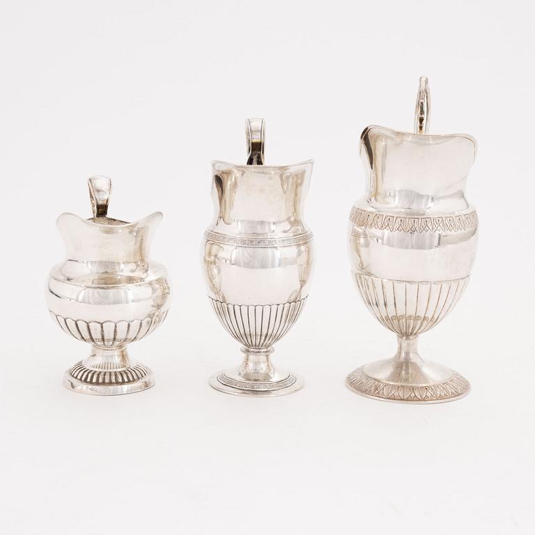 A set of three Swedish silver Empire jugs, first part of the 19th Century.