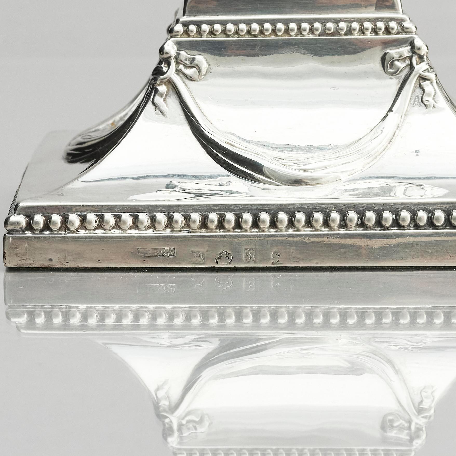 A pair of silver candlesticks, marks of John Parsons & Co, Sheffield, possibly 1784-85.