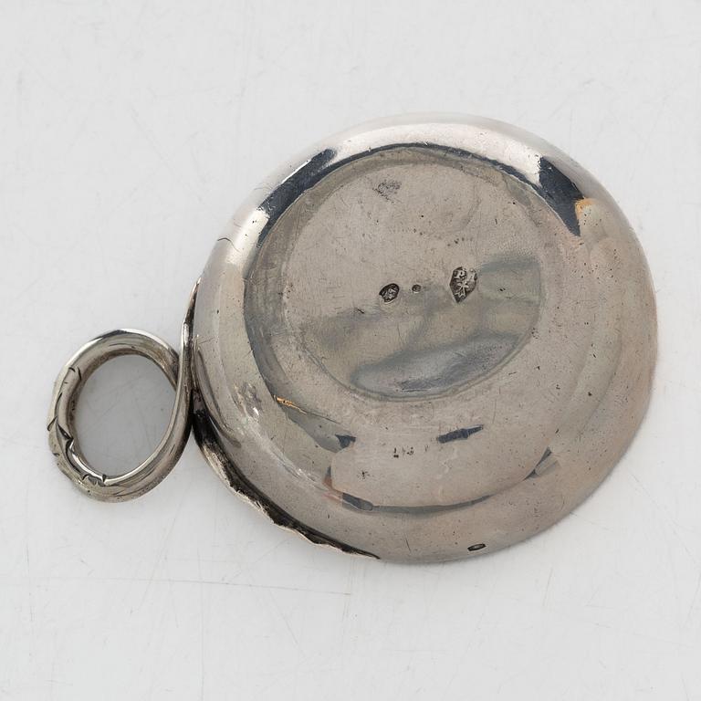 A French silver tastevin, mid-19th Century.