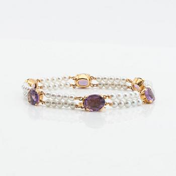 Bracelet, Engelbert, 18K gold with amethysts and pearls.