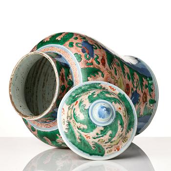 A pair of Transitional Wucai jars, 17th Century.