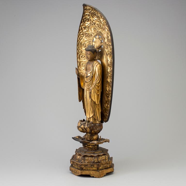 A large wooden lacquered figure of buddha, Japan, 19th Century.