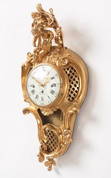 A French Louis XV ormolu cartel clock marked Baudin à Paris, mid 18th century.