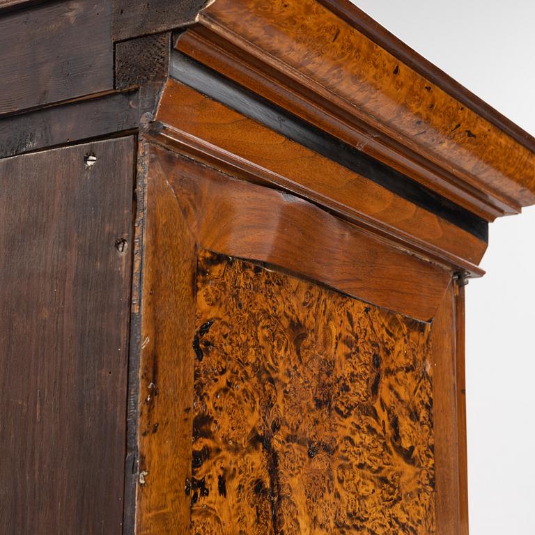 A burr alder, elm, and gilt-brass mounted late Baroque cabinet, first part of the 18th century.