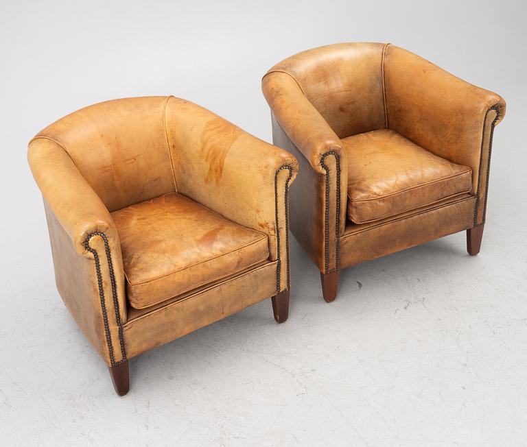 Club chairs, a pair, Bendic International, late 20th century.