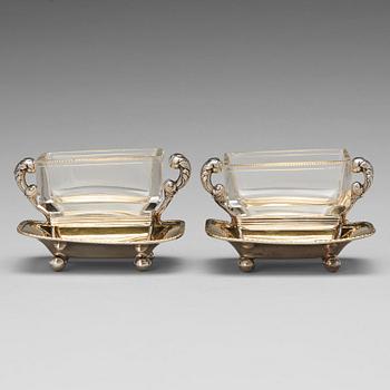 A pair of Swedish 19th century parcel-gilt silver and glass jelly-bowls, mark of Carl Tengstedt, Gothenburg 1839.