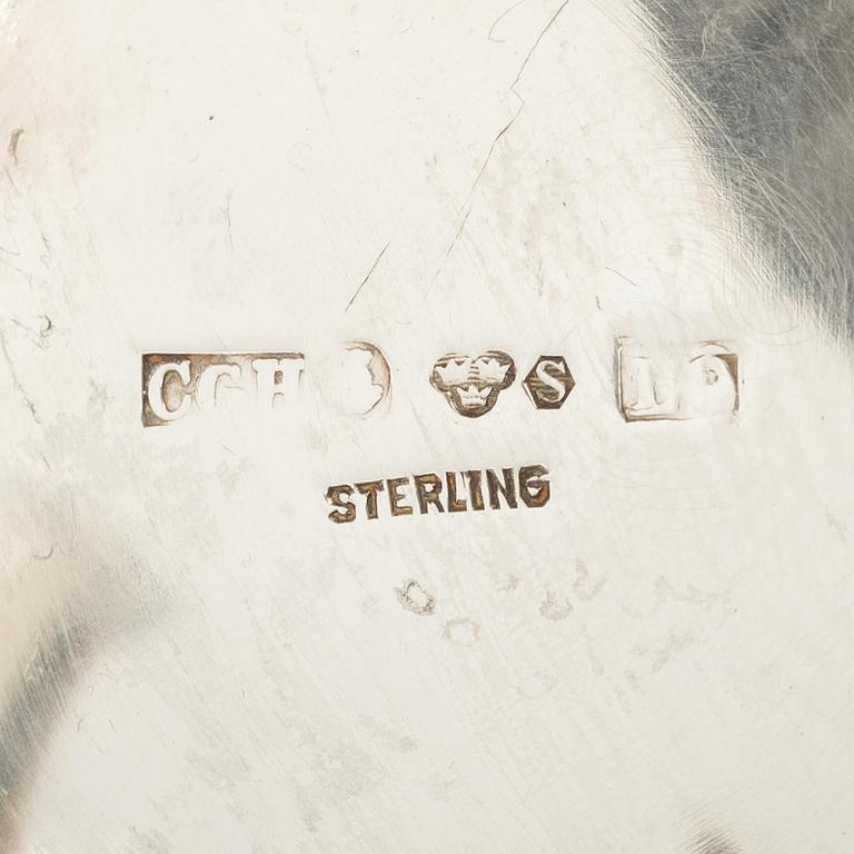 Two silver beakers and a bowl,