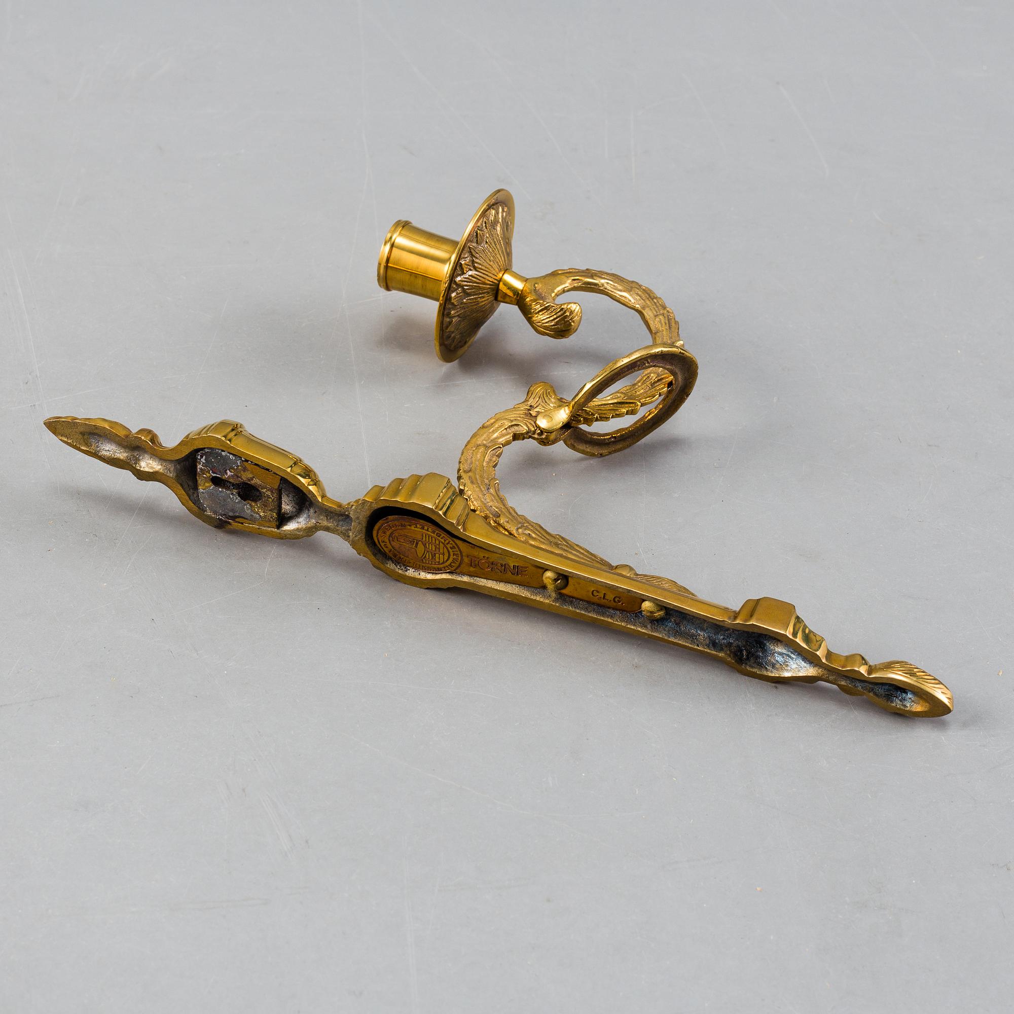 A pair of brass 'Törne' wall sconce, Ikeas 18th century Swedish Furniture series.