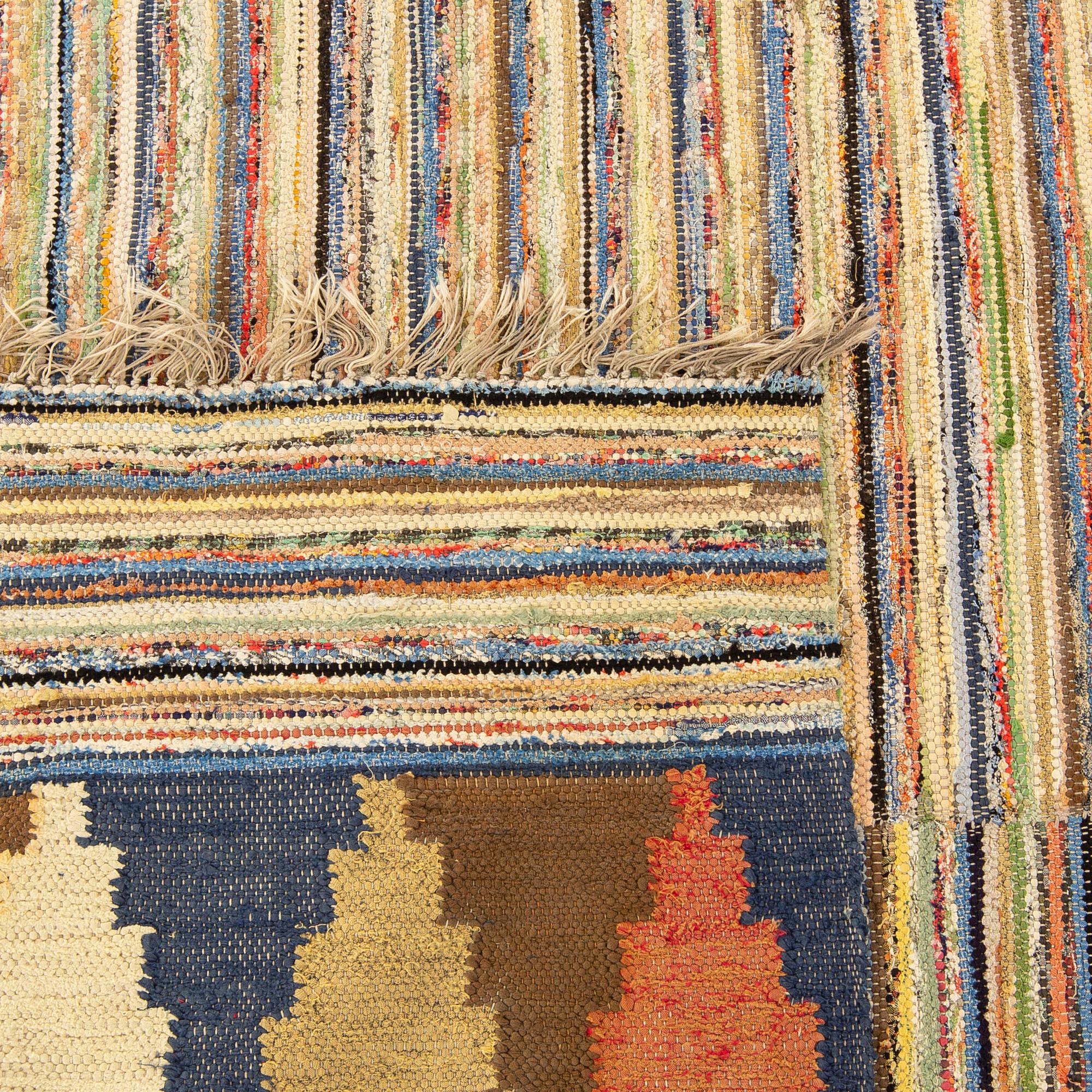 A Swedish flat weave carpet 1930/40's ca 255 x 179 cm.