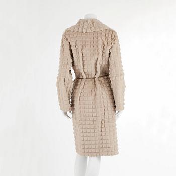 BROR AXEL PETERSEN, a beige rabbitfur coat. Size M.
