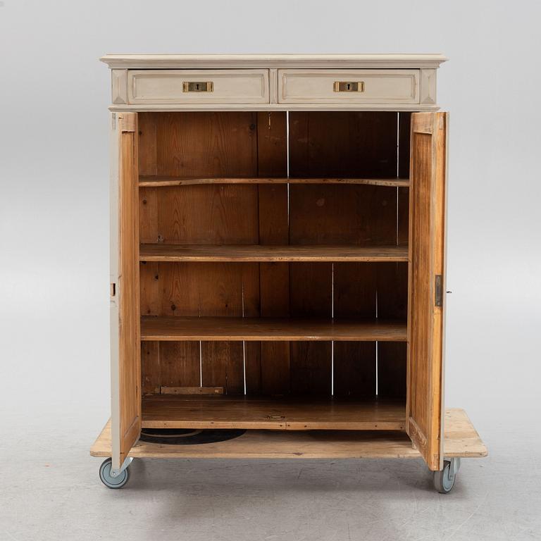 A painted cabinet from around the year 1900.