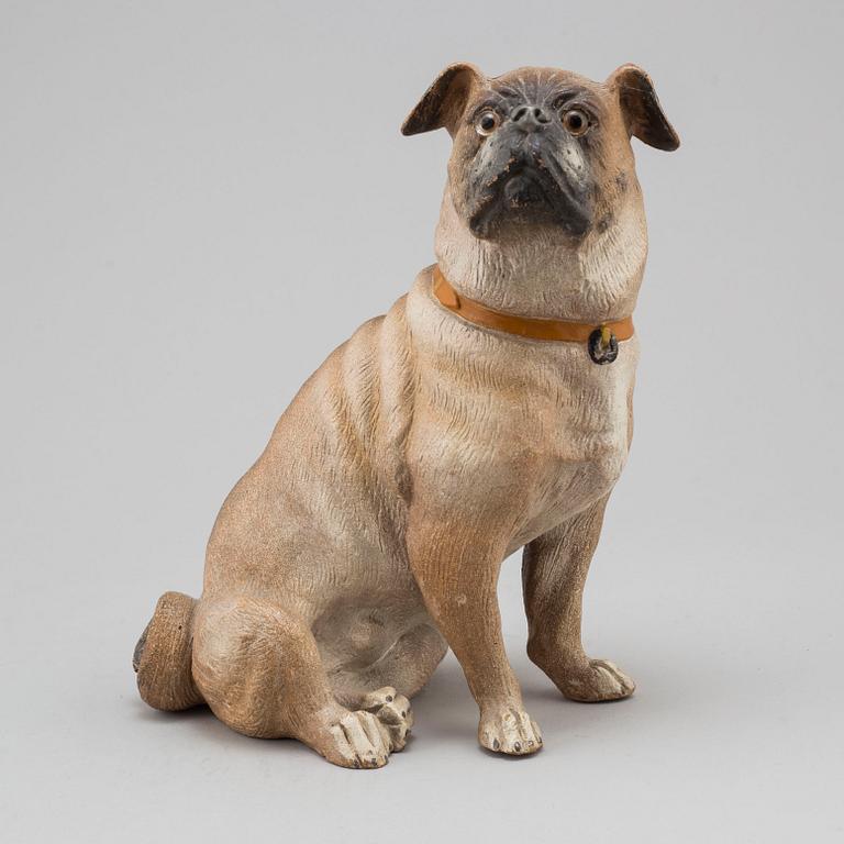 An early 20th century terracotta dog.