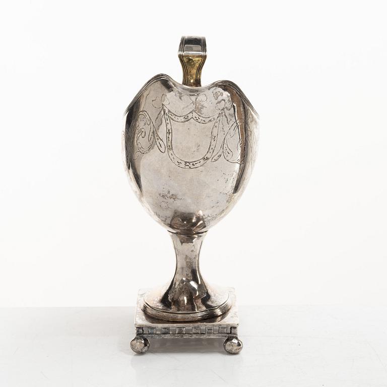 A Swedish Gustavian parcel-gilt silver sauce jug, mark of Daniel Hallman, Stockholm 1810.