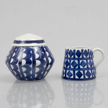 Karin Björquist, a set of nine "Indigo" stoneware vases and bowls, Gustavsbergs studio, 1950s.