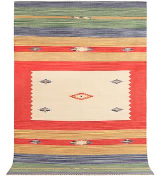 A Durry carpet, c. 300 x 200 cm.
