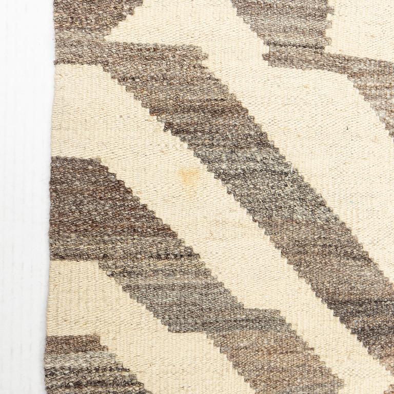 A Kilim carpet, c. 290 x 250 cm.