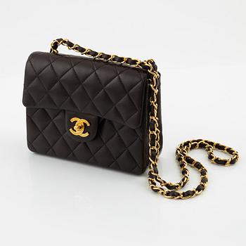 Chanel, A brown leather 'Mini Flap' bag, 1996-1997.