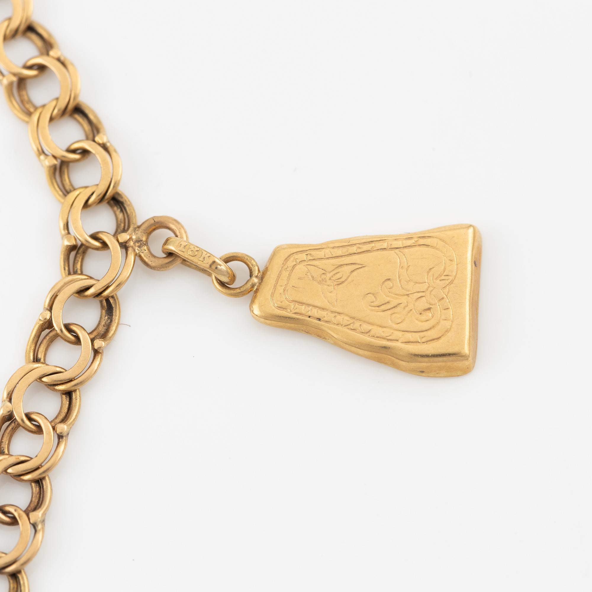 Armband, 18K guld, med berlocker.