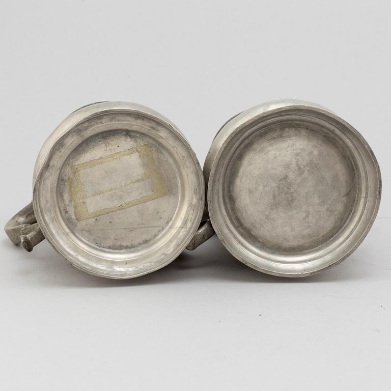 Two Swedish pewter tankards from the second half of the 18th century and 1819.