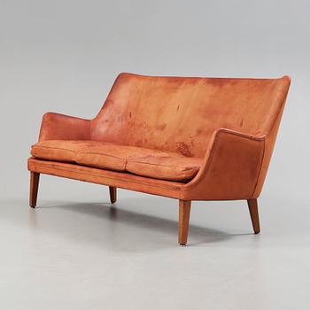 An Arne Vodder brown leather sofa, executed by Ivan Schlechter, Denmark 1950's-60's.