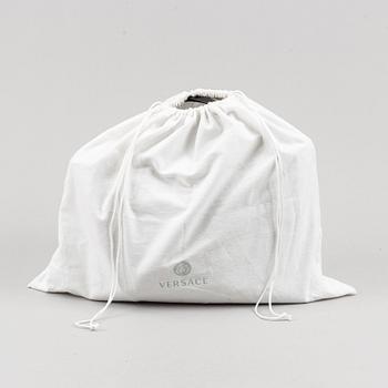 Versace, a black quilted leather handbag.