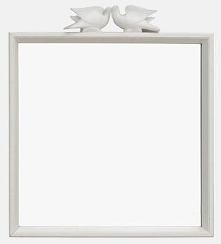 642. An Estrid Ericson wooden framed mirror with a pair of alabaster pigeons, Firma Svenskt Tenn.