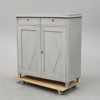A mid 19th Century painted cupboard.