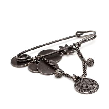 PRADA, a metal needle brooche.