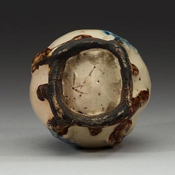 A stoneware peach-form water dropper, Choson period, 18th century. Korea.