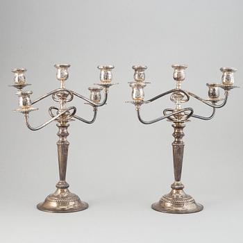 A pair of Louis XVI-style silver candelabra, 20th century marked Mexico.